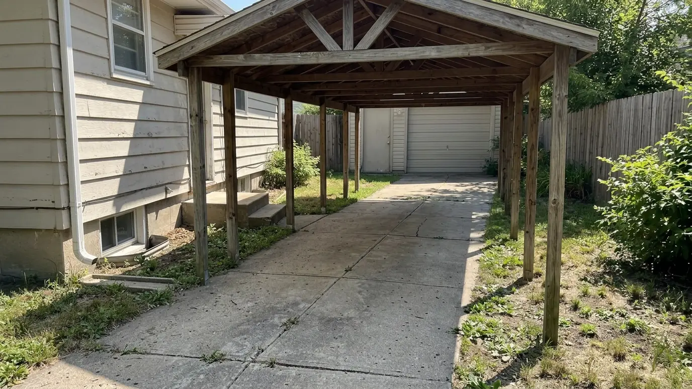 After: Bare path gets a covered walkway | Music City Pergola After: a path between a house and a garage with a timber covered walkway with a gabled roof